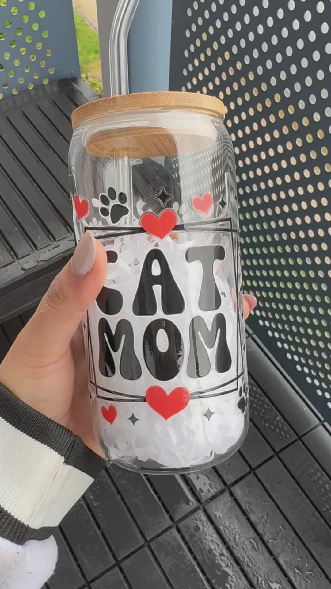 video of cat mom glass can